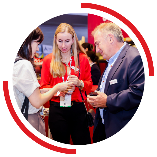 People exchanging business cards at Intermodal Asia